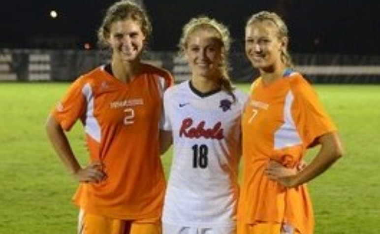 Cardinal Appeal: SLS Grads smiling after a college soccer match